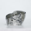 Handcrafted sterling silver ring, adjustable size, 14 mm wide shank with circle cutouts and dots, made by roffjewellery.com