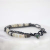 delicate handmade bracelet made of small opalescent beads with dark metal chain, unique unisex bracelet by roff jewellery
