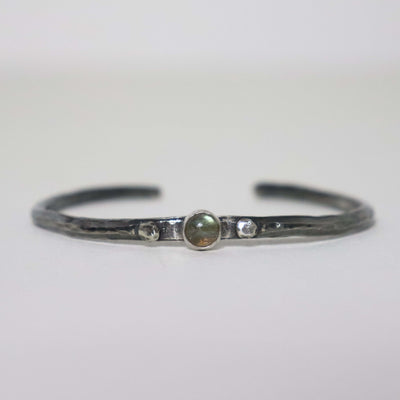 Handmade hammered silver cuff with round green labradorite