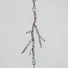silver twig shaped pendant on statement necklace. handforged by roff jewellery