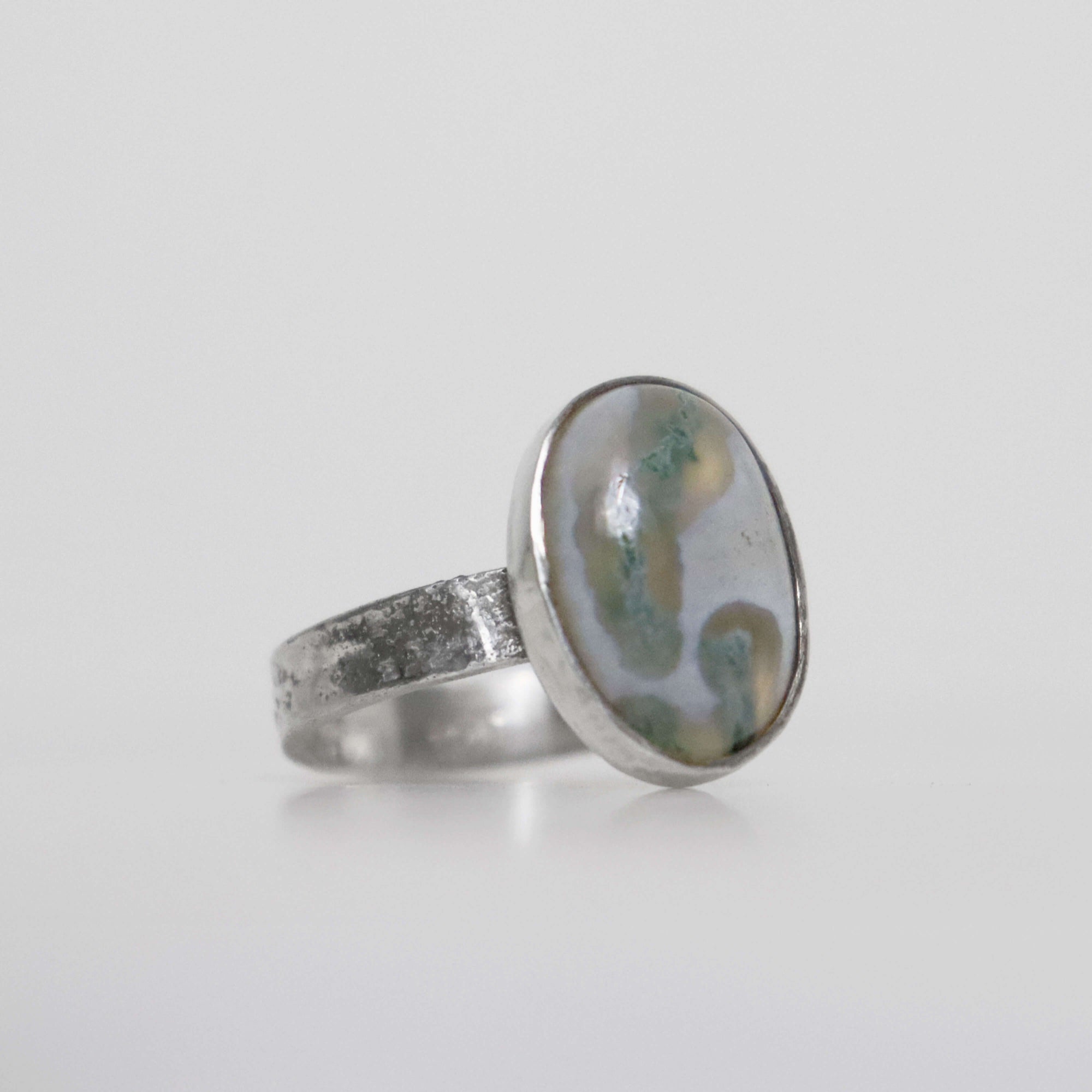 Adjustable textured silver band with solar quartz stone, handcrafted by Roff