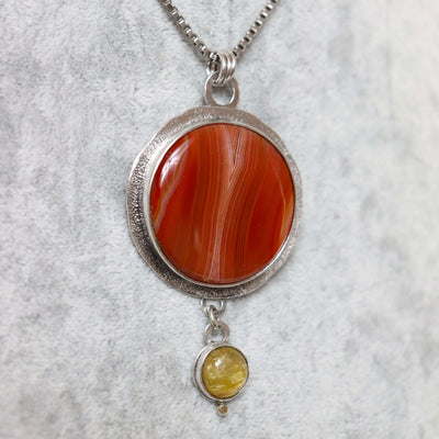 Radiant red agate necklace with rutilated quartz
