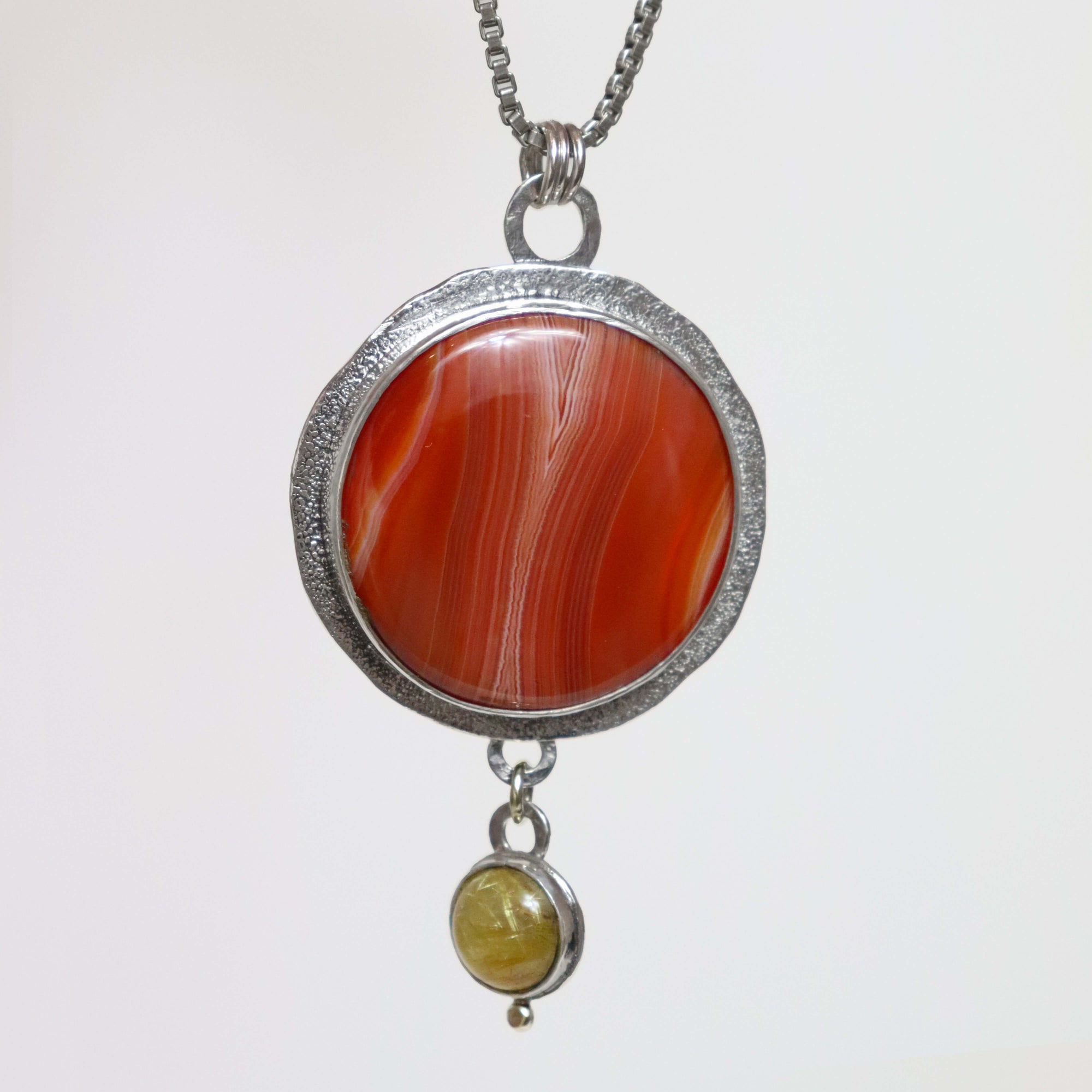 Radiant red agate necklace with rutilated quartz