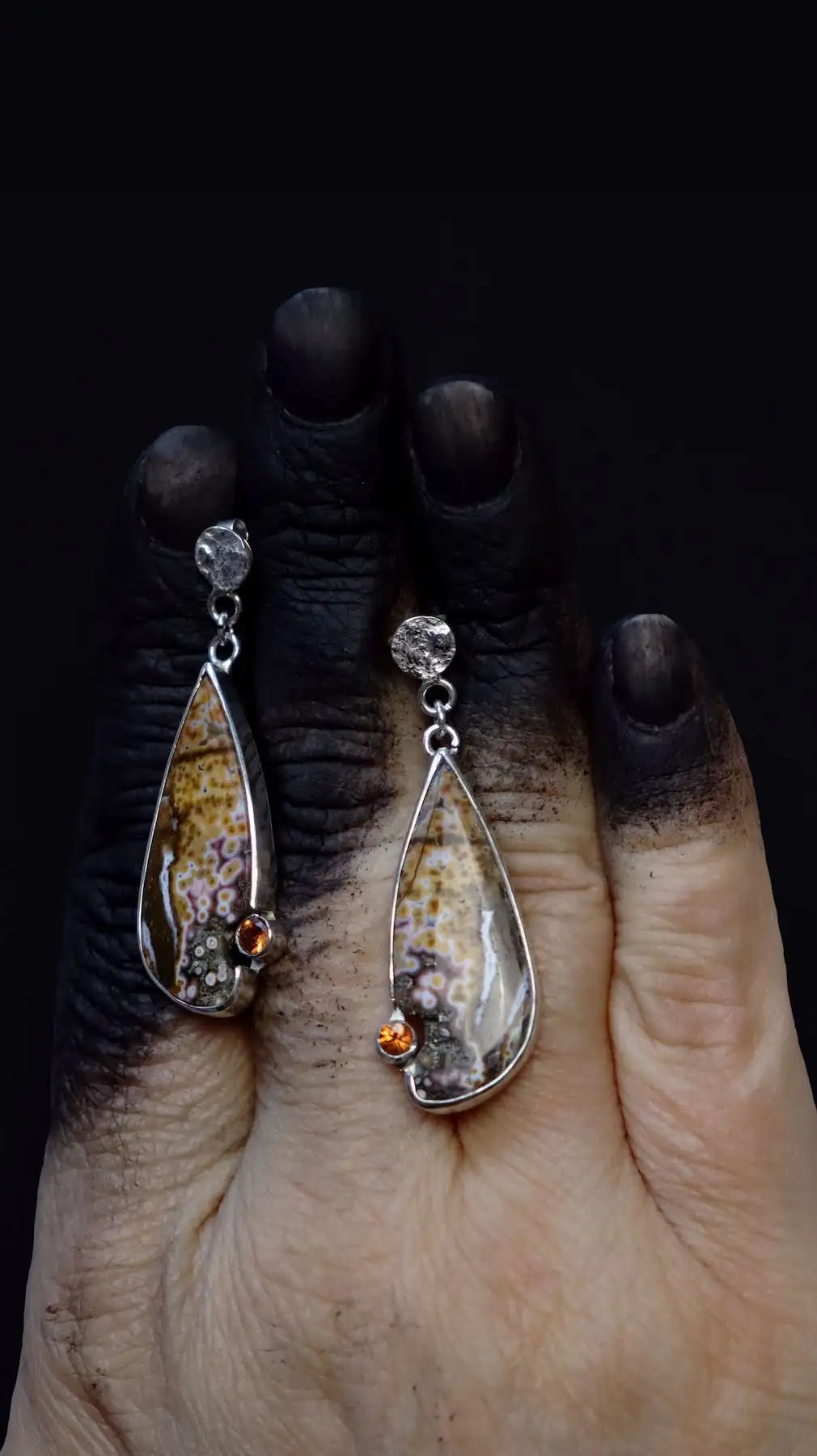 silver earrings set with oblong ocean jasper and sapphire 