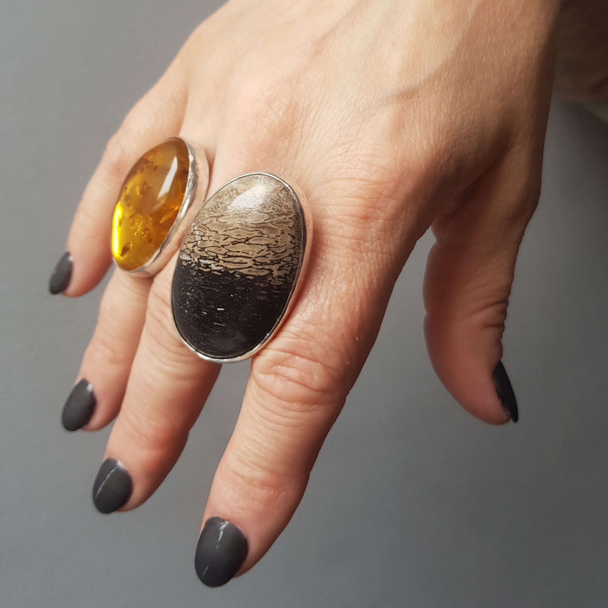 large handmade cocktail ring, silver with amber and fossil dinosaur bone stone by roff jewellery