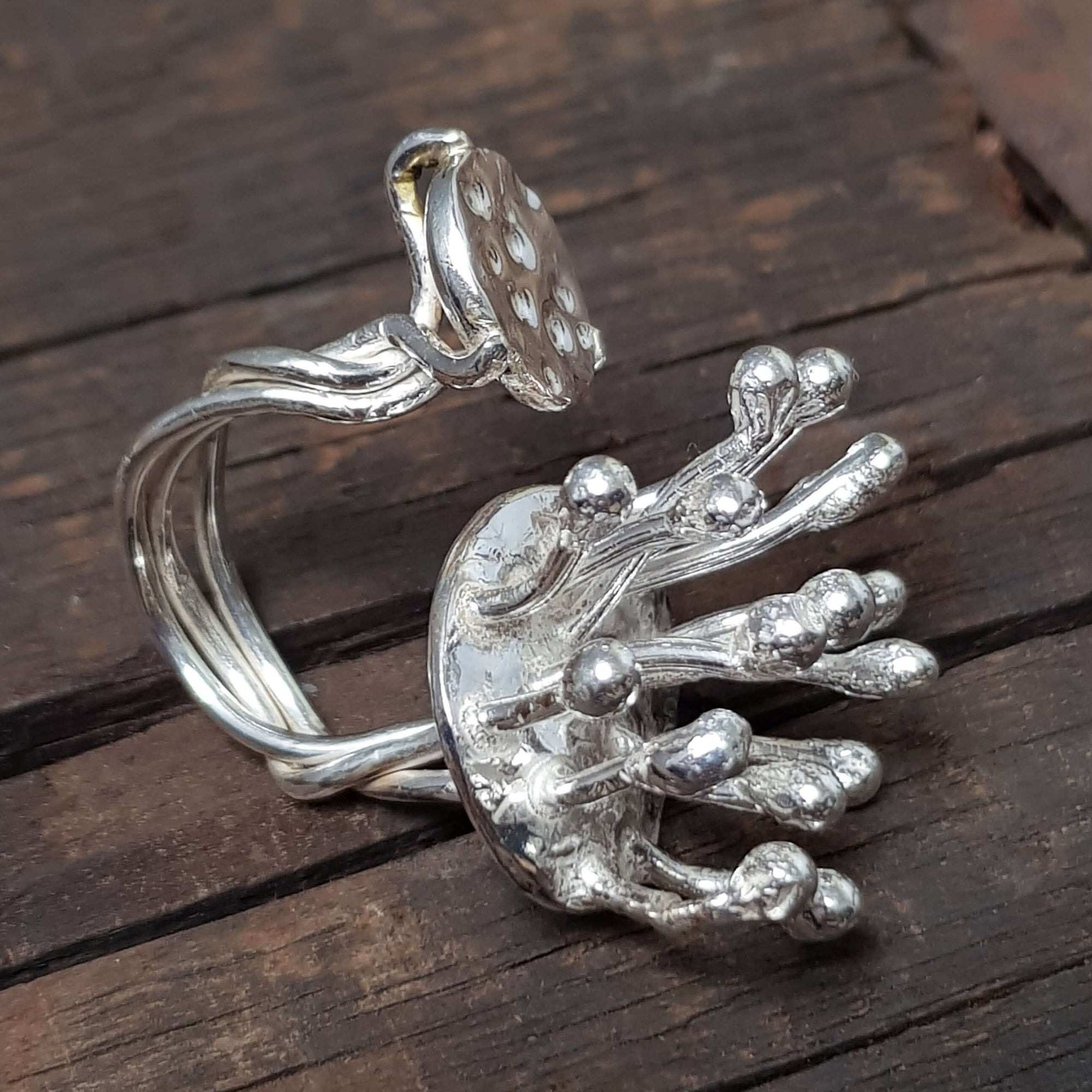 sterling silver statement ring, inspired by nature. open front ring, adjustable, handmade by roff