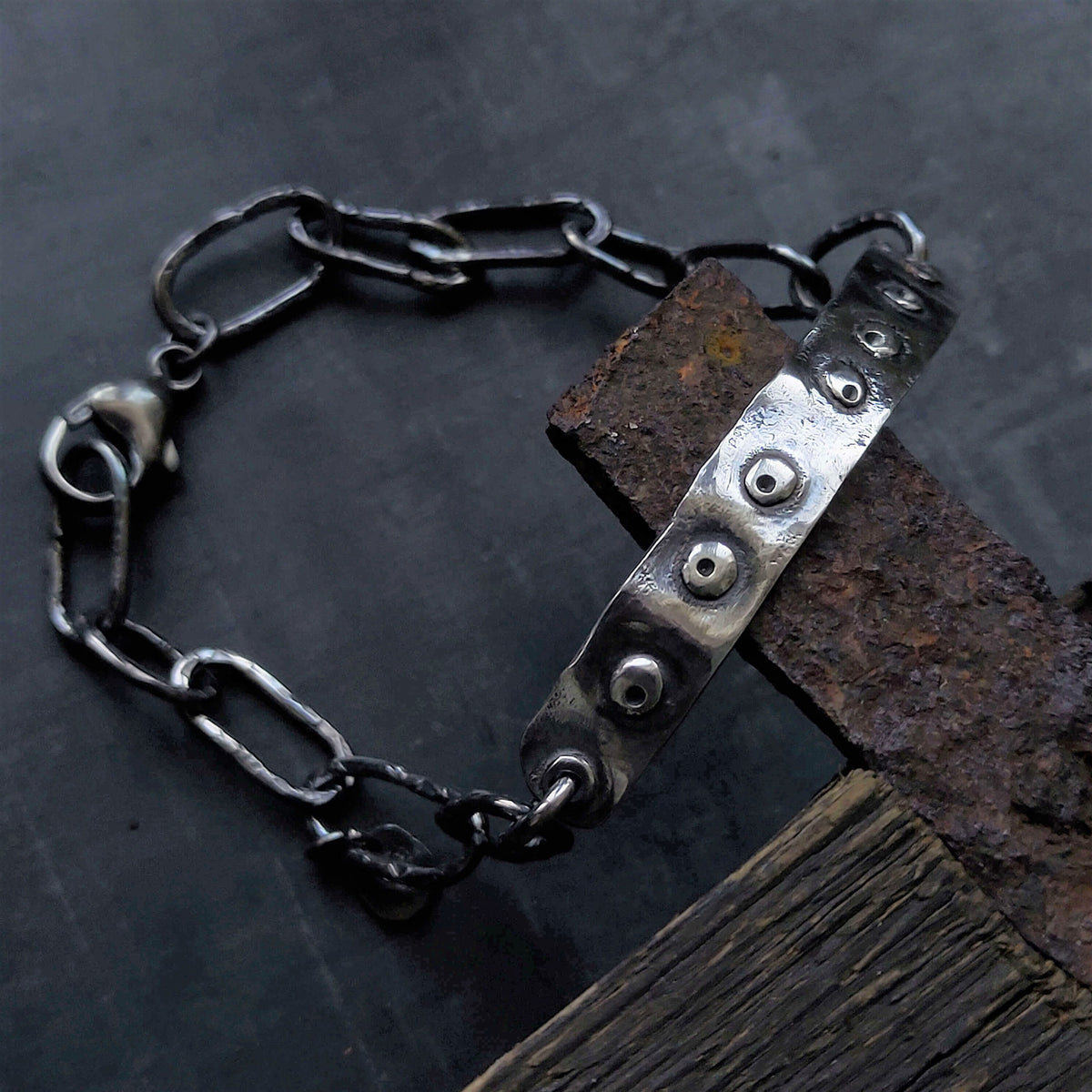 silver name bracelet, with silver dots, handmade silver links and round clasp by roff jewellery