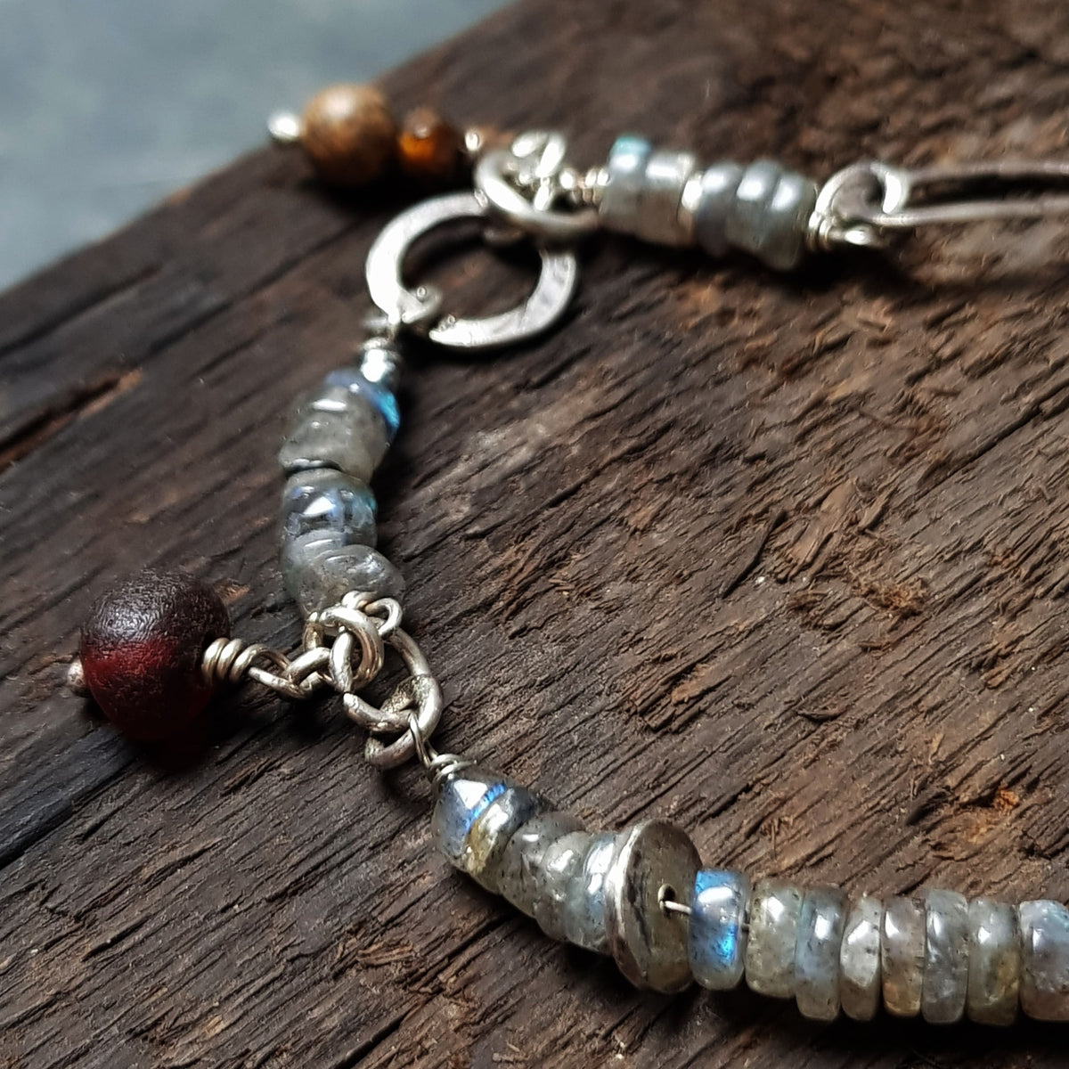 Blue labradorite bracelet with hammered silver links and gemstone charms, rustic style handmade roff