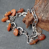 rustic amber beads in handmade link bracelet, oxidized silver, silver charms, by roffjewellery.com