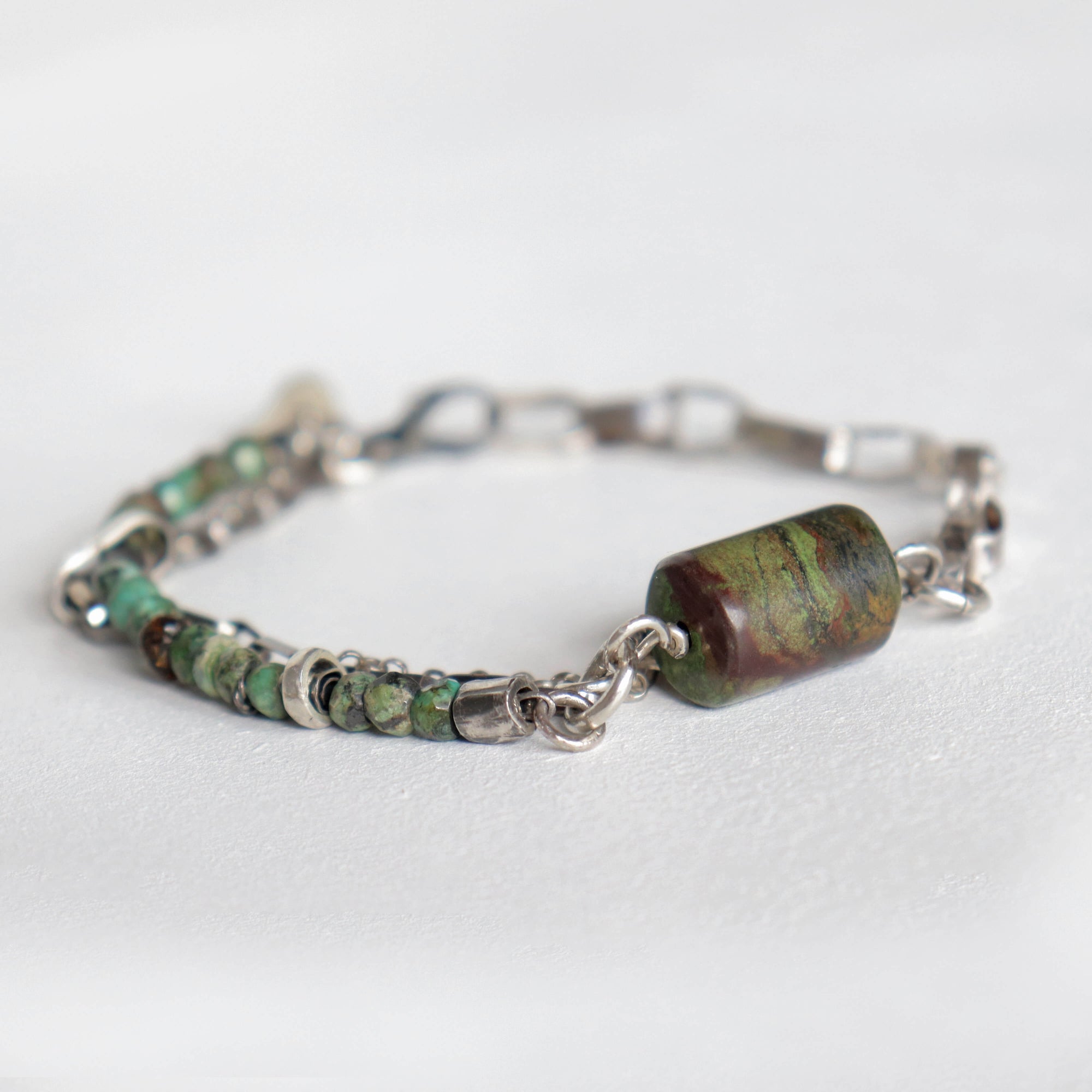 Multistrand beach bracelet with cylindric large turquoise bead , round facetted turquoise beads, silver beads, silver chain, handmade silver unisex bracelet