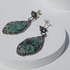 alternative fashion earrings, brutalist statement earrings, handcrafted by roff jewellery emerald