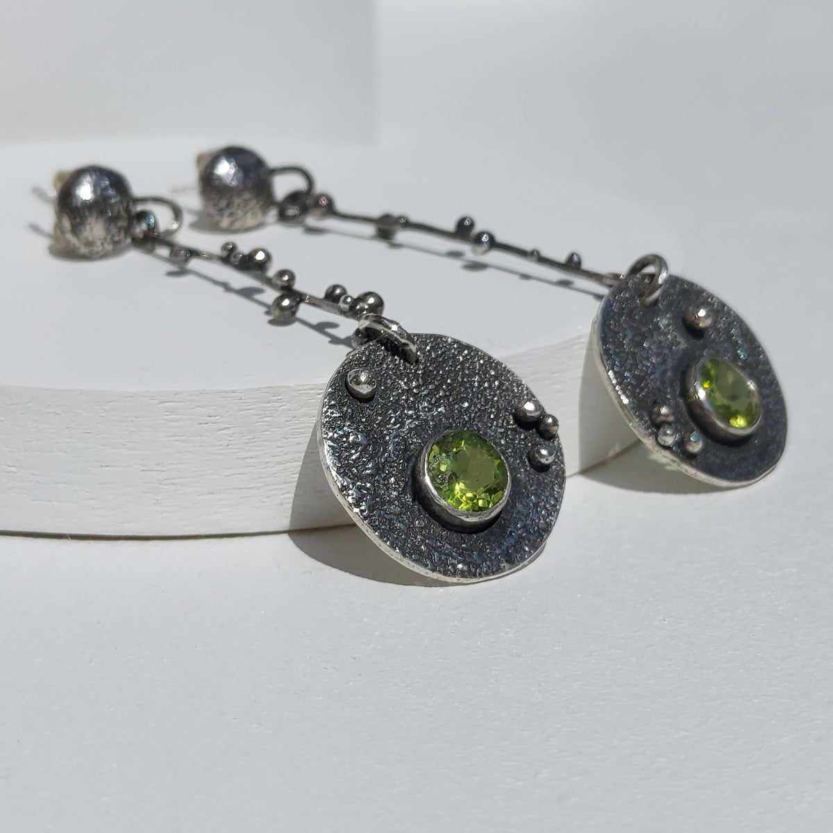 oxidized silver drop earrings with green peridot, rustic modern earrings, made by hand by roff