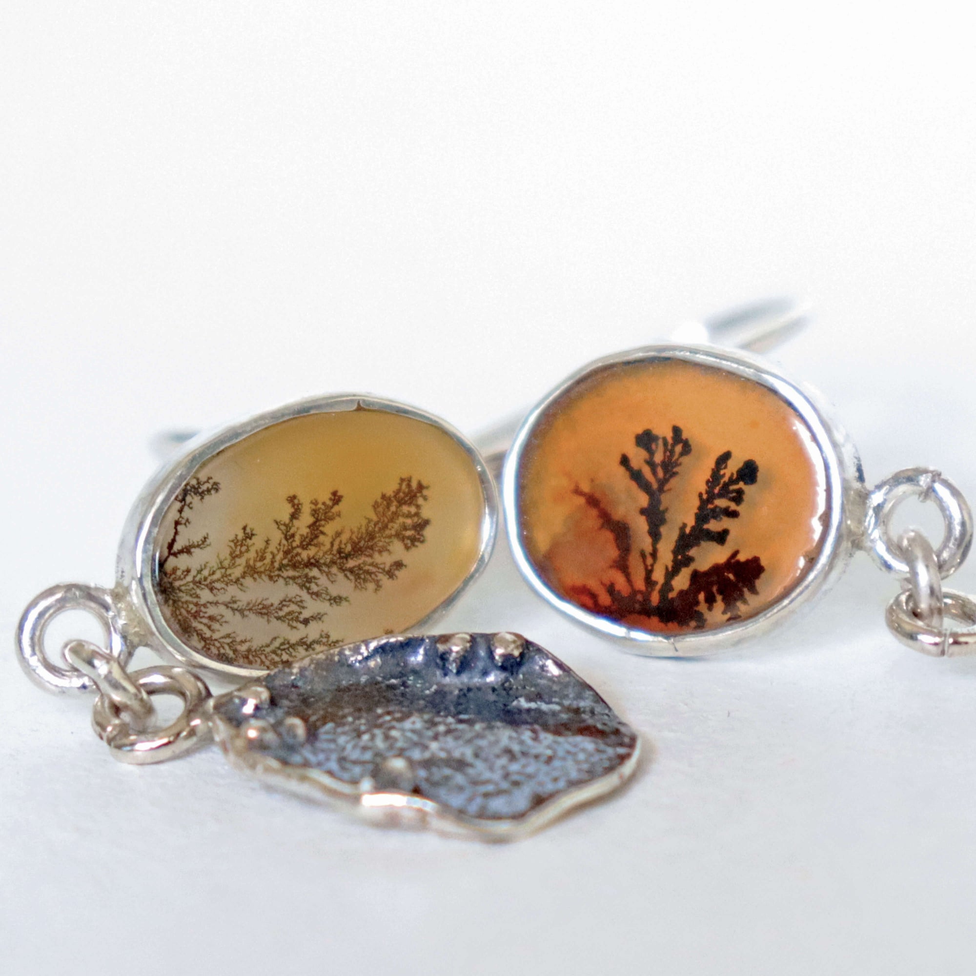 silver dangle statement earrings, handmade earrings with dendritic agate by bench jeweller Roff