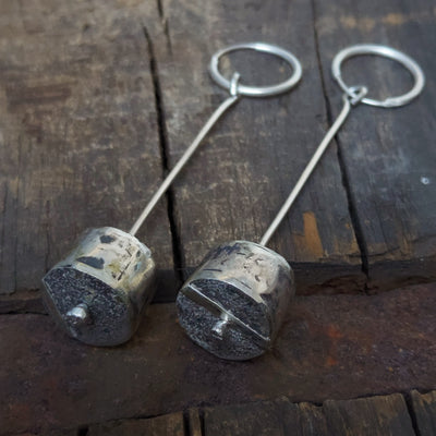 silver earrings, handmade cylindrical silver beads, hammered, textured and oxidized, by Roff