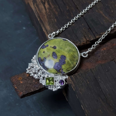 contemporary silver necklace with atlantistie, peridot and amethyst, handmade by roff jewellery
