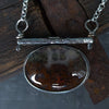 hammered silver beam with moss agate pendant on silver jasseron chain, handmade by roffjewellery.com