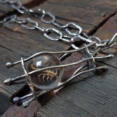 eccentric necklace, with a long handmade oxidized hammered silver link chain, by roff jewellery