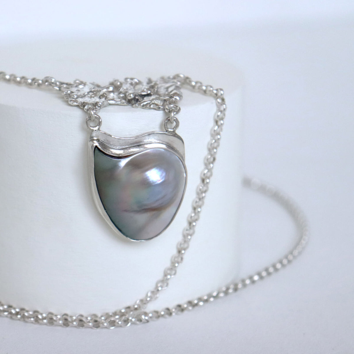 organic shape silver with mother of pearl on silver rolo, handmade modern classic necklace by roff