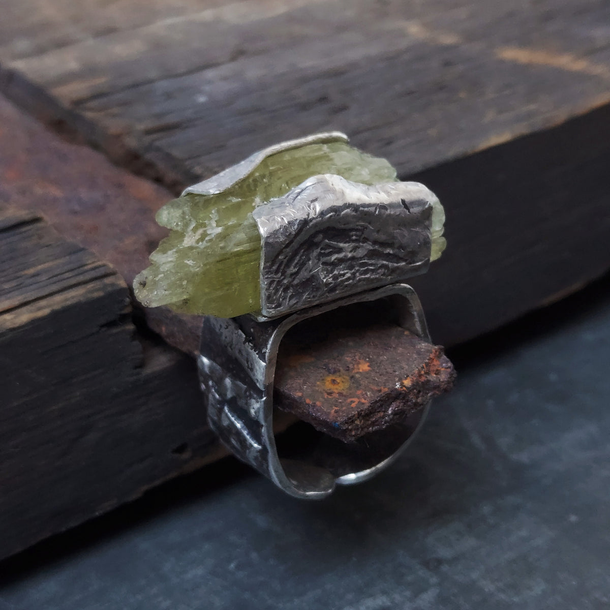 oxidized silver ring, adjustable, bold ring. With a rough hiddenite, handmade statement ring by roff