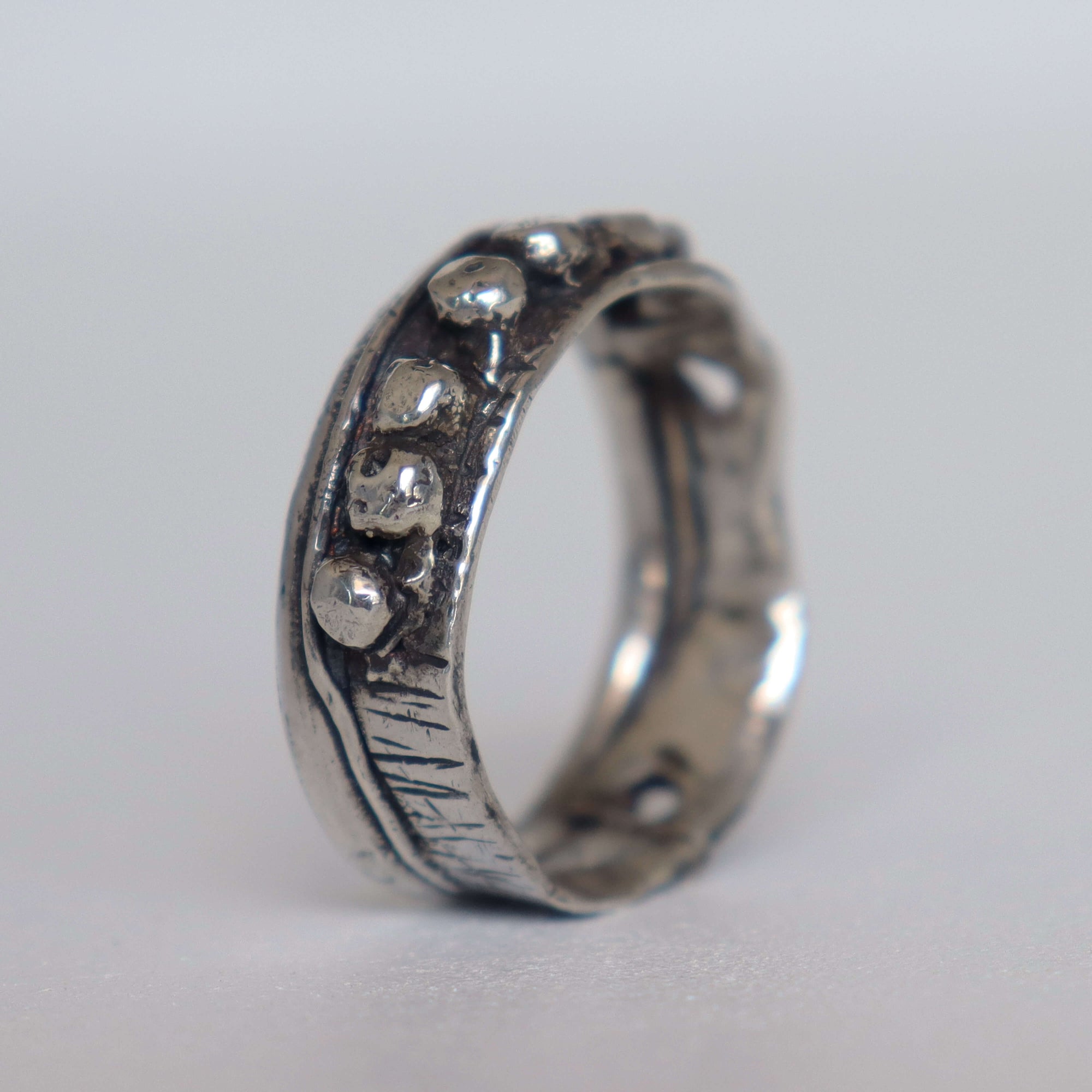 ring for him, hammered silver and silver balls granules, organic texture, handcrafted by roff
