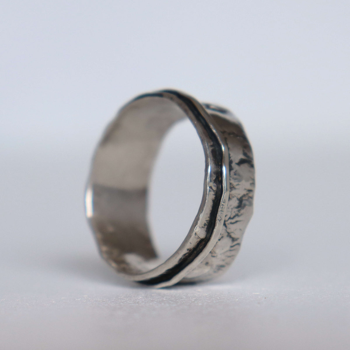 Men's ring in sterling silver, handmade with rough texture and oxidized silver. Handmade by roff
