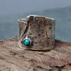 Textured and oxidized silver ring with small round turquoise gemstone. Unisex wide ring, can be worn as a thumbring as well