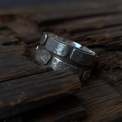 wide silver ring with brick pattern or wall pattern, all handmade to order in any size by roff jewellery. 925 sterling silver ring