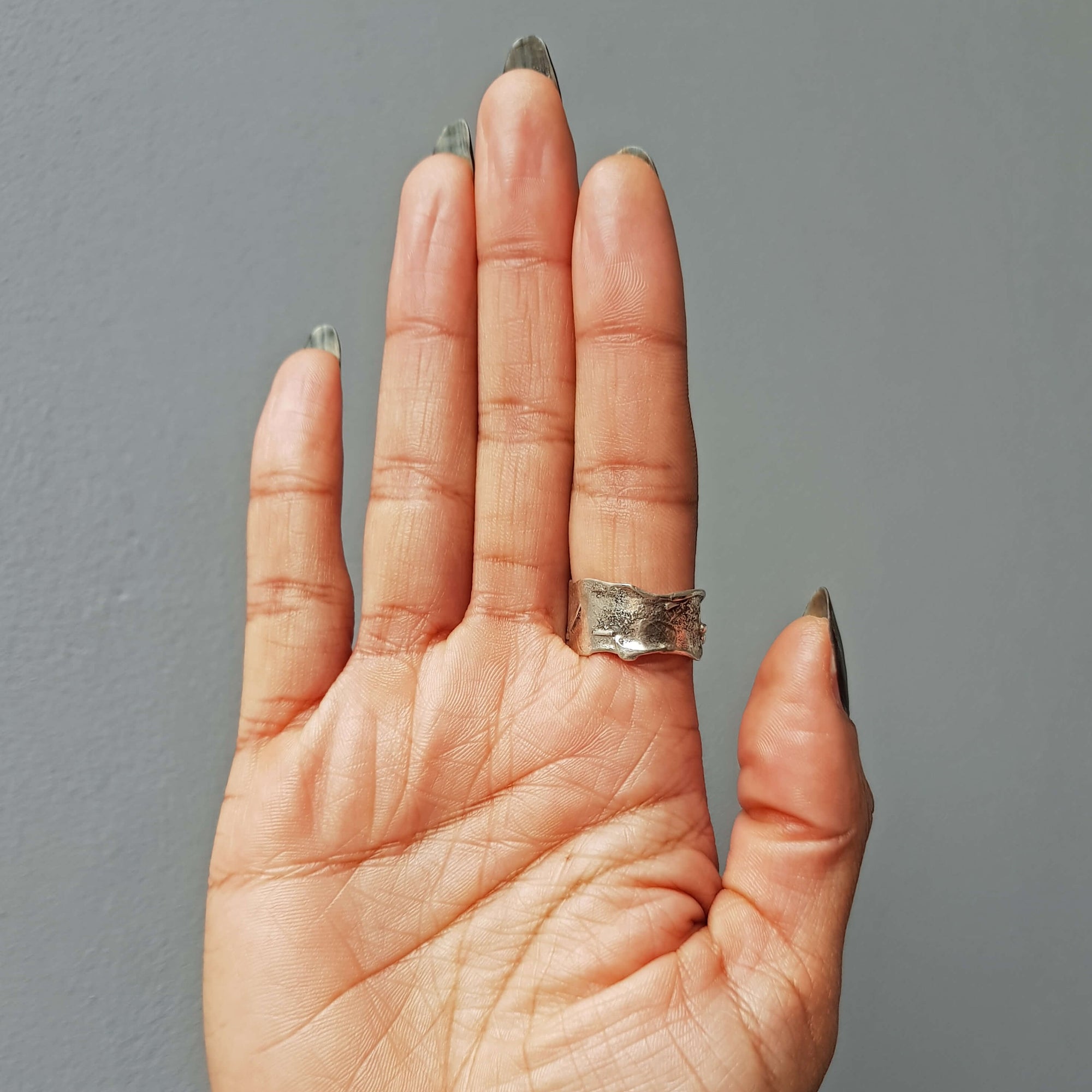 back of the texturized brutalist style silver ring with moonstone, handmade by roff jewellery