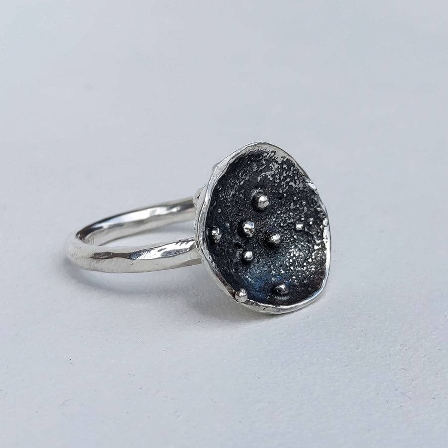 organic silver ring, hammered silver band, silver granules and dark patina, handmade by roff