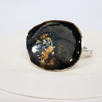 trendy dark silver ring with gold, round hammered bowl on adjustable ring handmade by roff jewellery