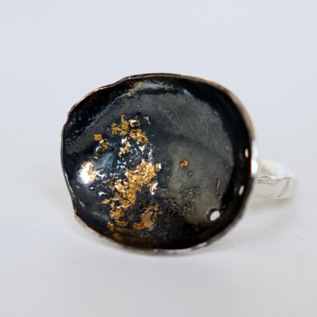 handmade silver and gold ring, silver hammered bowl with 24 kt gold flakes by roff jewellery