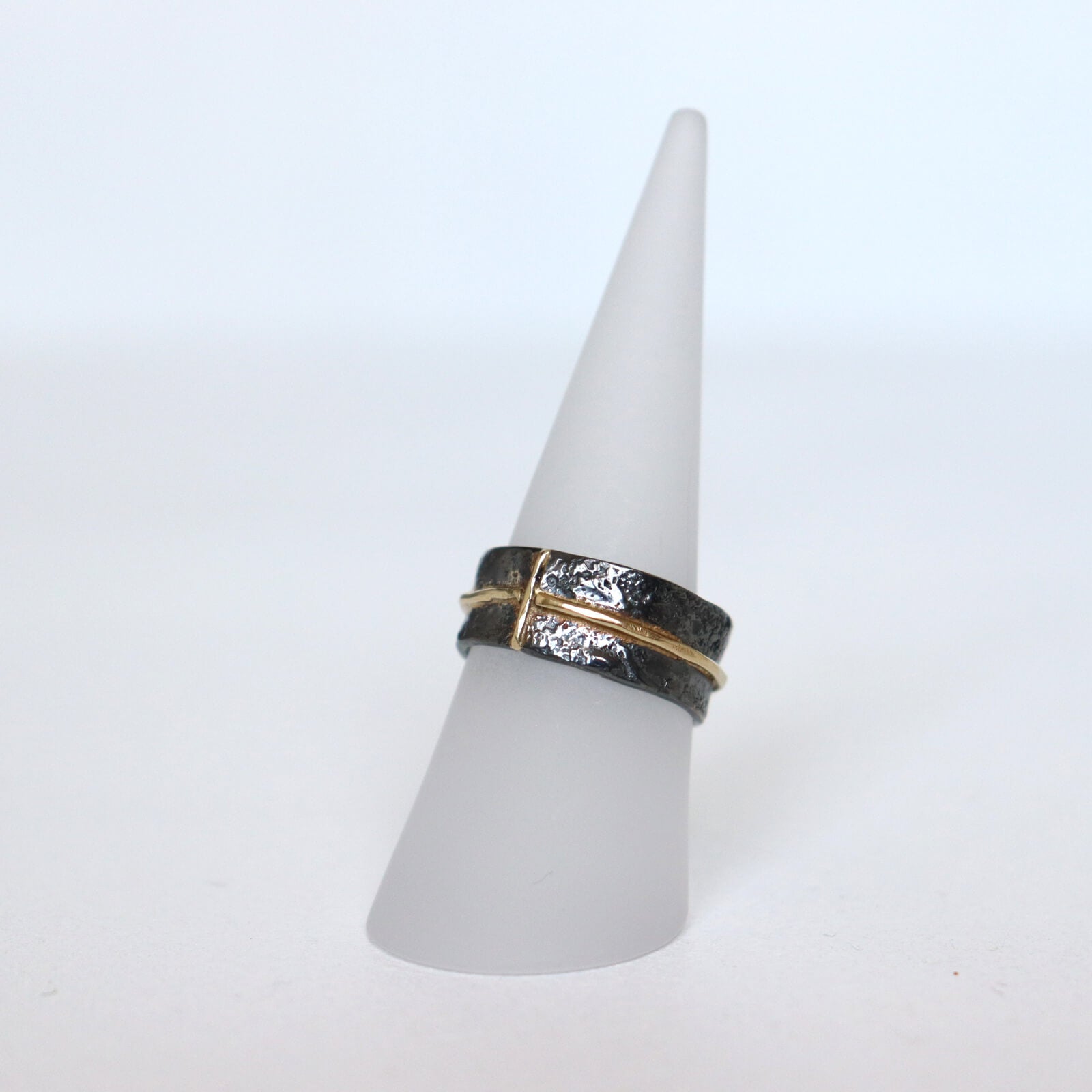 alternative wedding ring, dark silver and gold, hammered handmade ring by roff jewellery