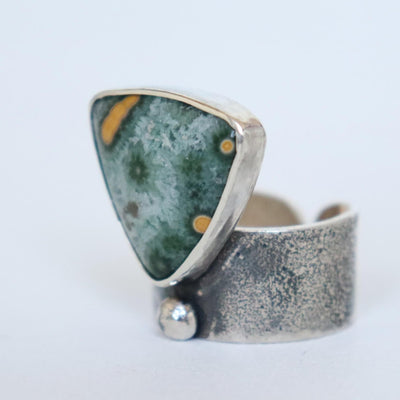 bold silver ring with wide ring band, adjustable ring with ocean jasper stone. Handcrafted by roff
