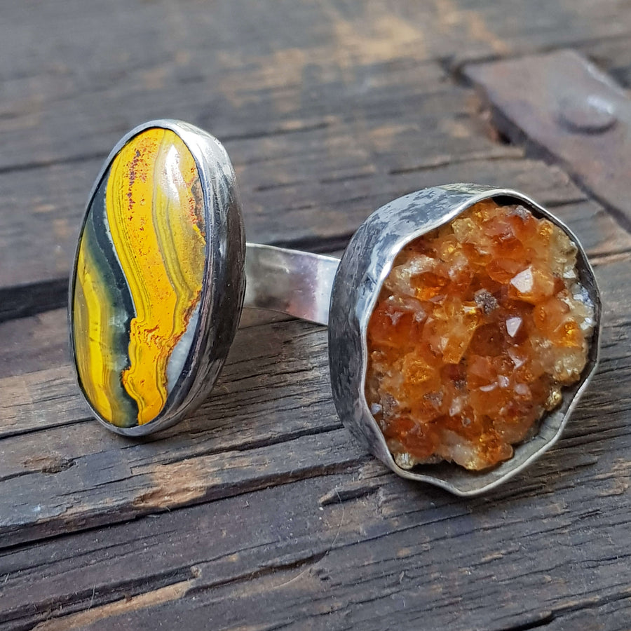 rough crystals in an open front adjustable silver ring with black patina. Handmade ring by roff