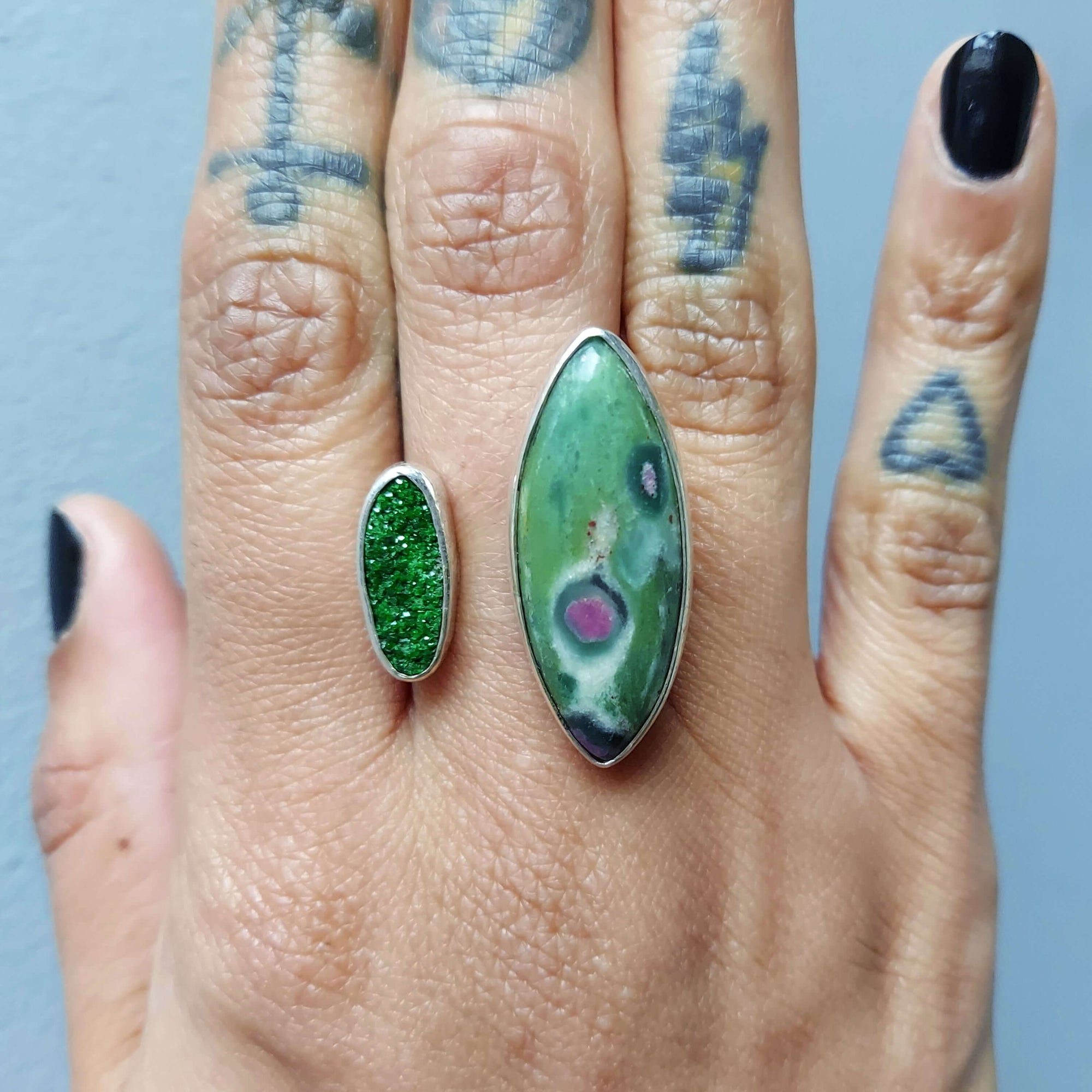 unusual designer ring with green gemstones, open front, adjustable, artisan made by roff jewellery