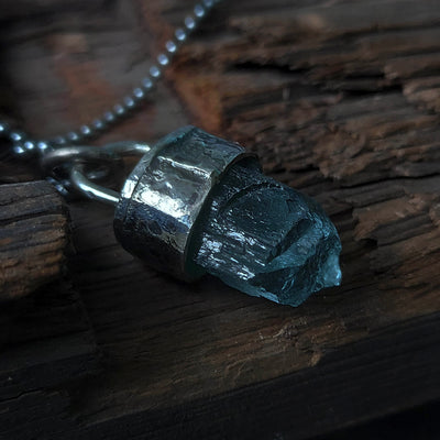 silver bullet necklace with crystal, handmade by roff jewellery, on a long ball chain.